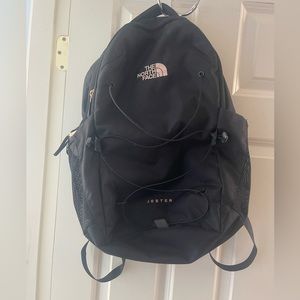 Black and rose gold North Face backpack owned for 6 months and gifted a new one
